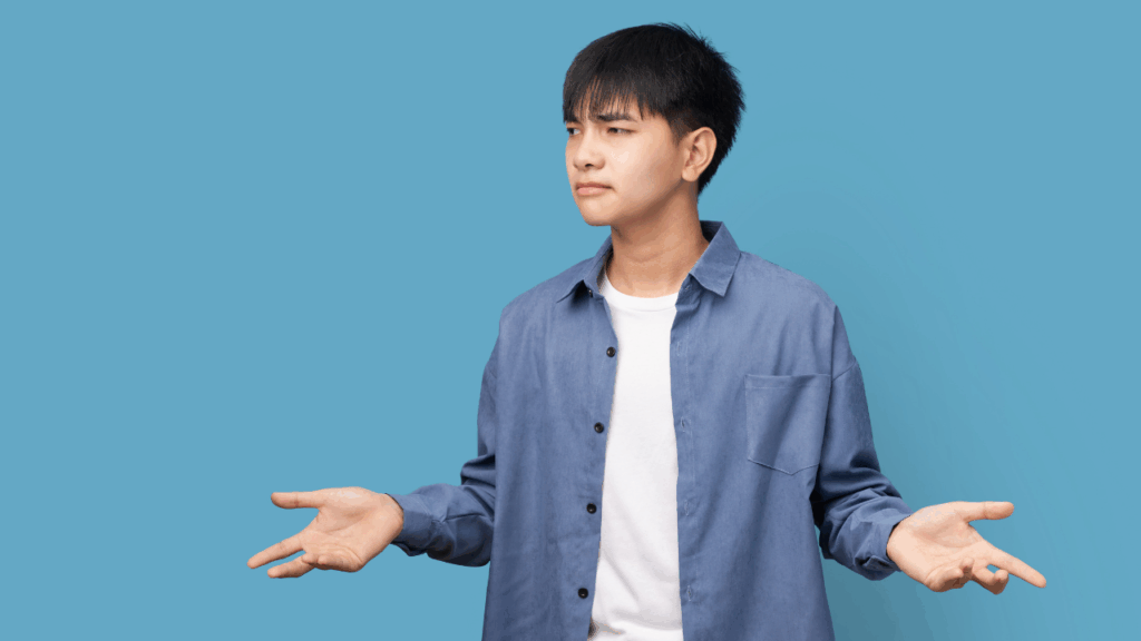 分からないポーズをする人